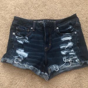 Ripped blue jean shorts